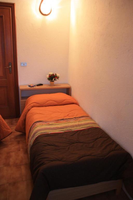 Hotel Bellevue Gignod Quarto foto