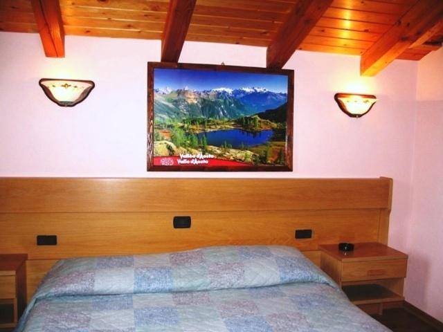 Hotel Bellevue Gignod Quarto foto
