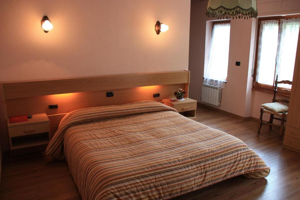 Hotel Bellevue Gignod Quarto foto